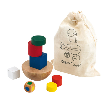 a wooden colorful tower set next to a natural cotton pouch