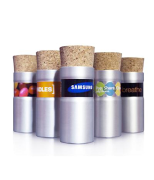 5 metal pods each with a full colour label and a large cork as a lid