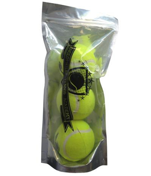 three tennis balls in a clear front sealed packet and 1 colour print