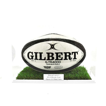 Rugby Ball Display Case with grass base and ball laid horizontally with engraved plaque