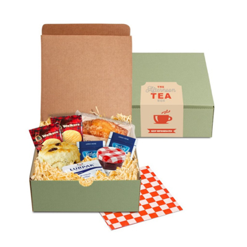 a green gift box containing afternoon tea ingredients with red napkin
