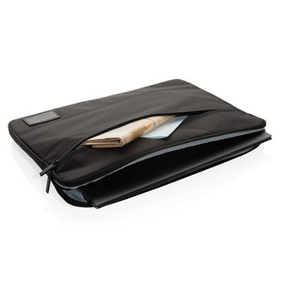 Black laptop sleeve filled with laptop and newspaper