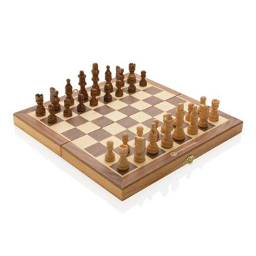 Wooden chess set with pieces on
