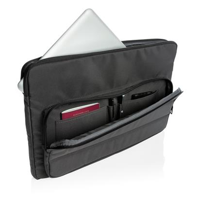 black laptop sleeve with an extra front pocket. Zip up. Shown carrying a laptop and notepad. 