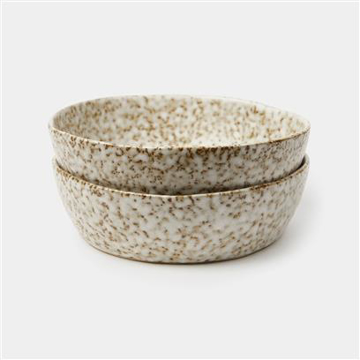 two beige bowls stacked