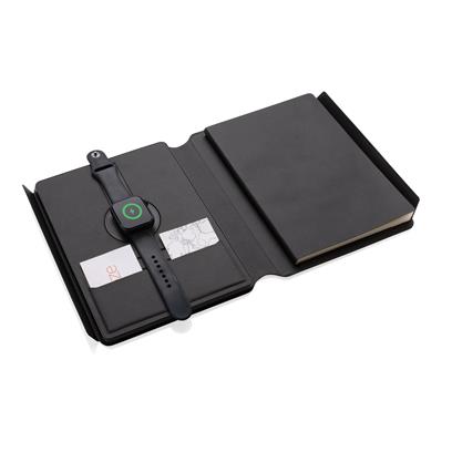 Swiss Peak RCS rePU notebook with 2-in-1 wireless charger open and charging watch